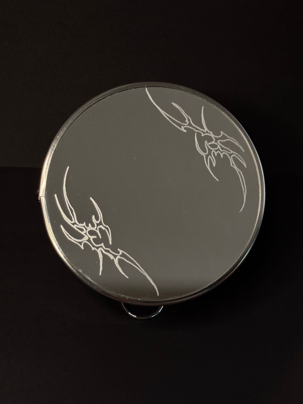 Tribal flame mirror
