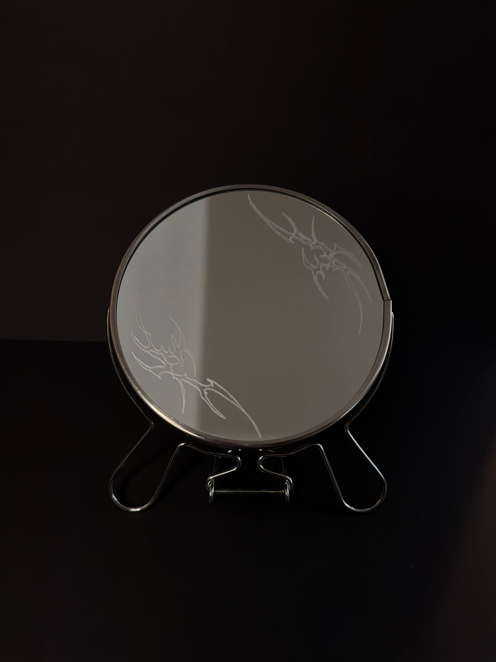 Tribal flame mirror