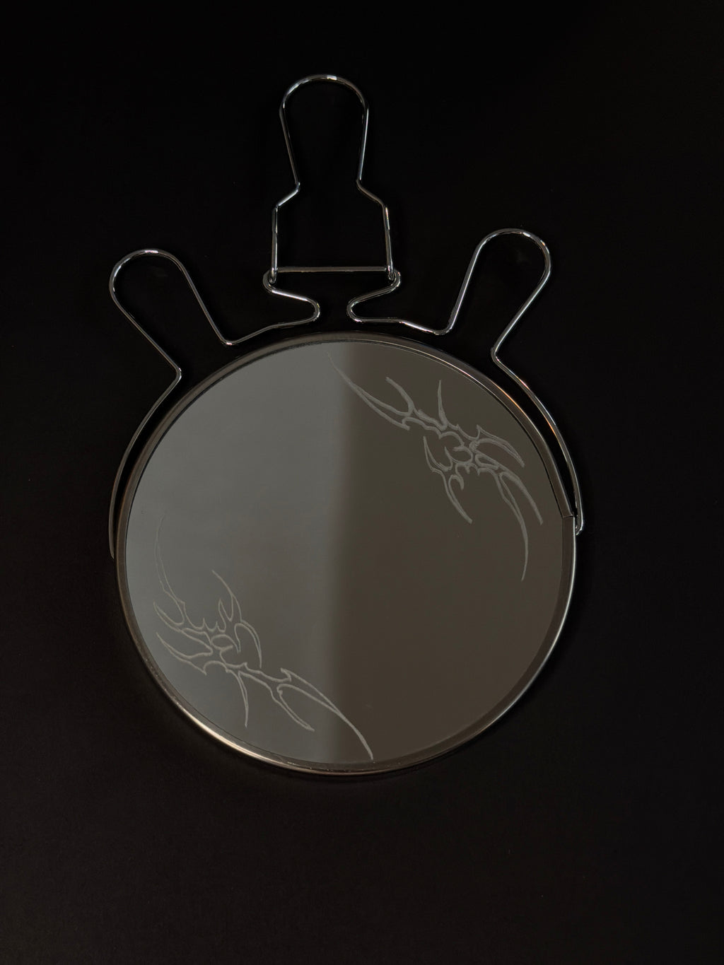 Tribal flame mirror