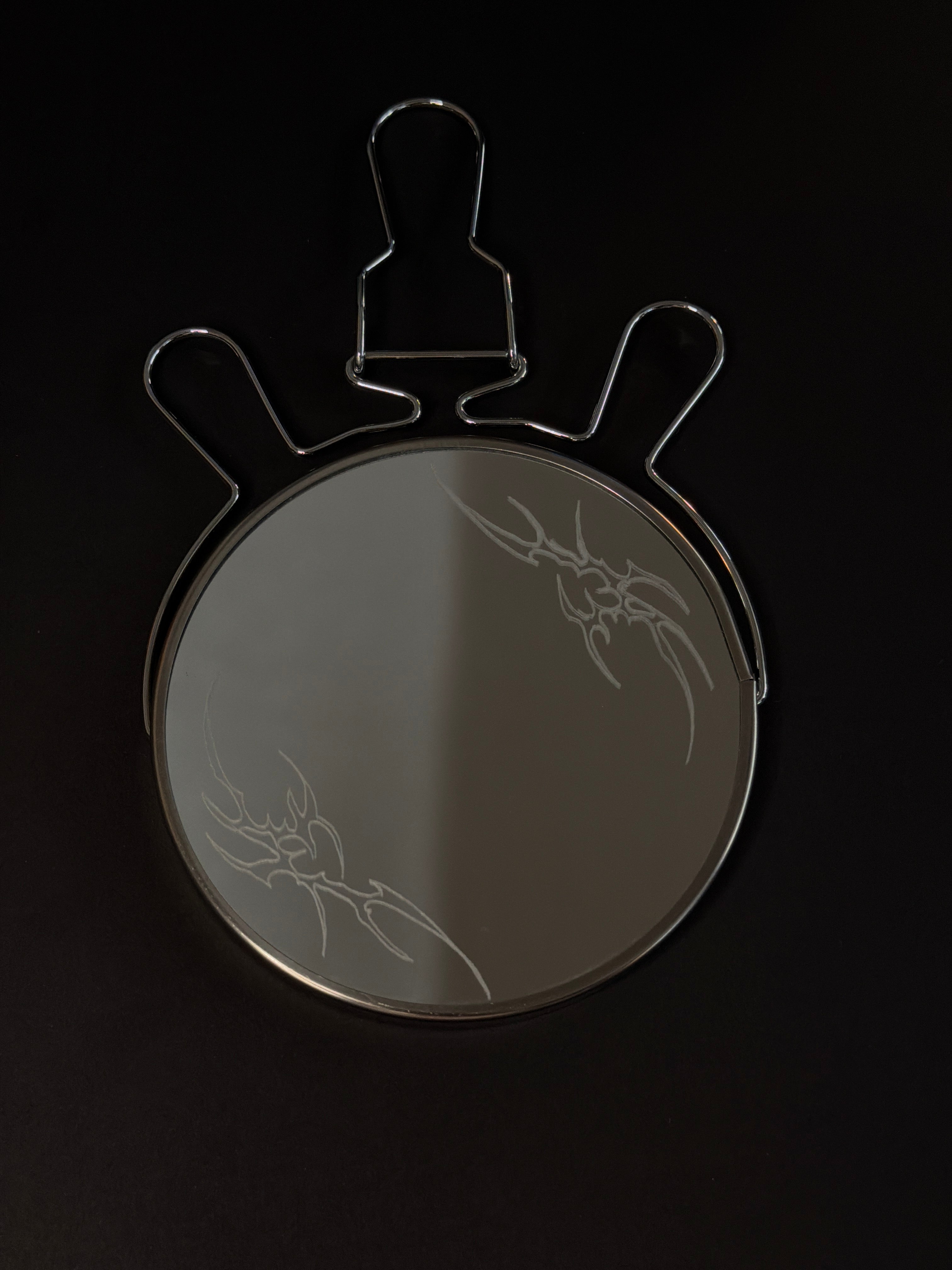 Tribal flame mirror