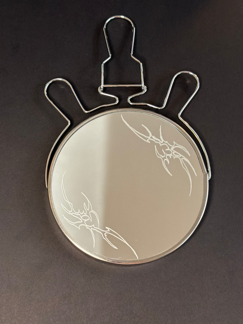 Tribal flame mirror