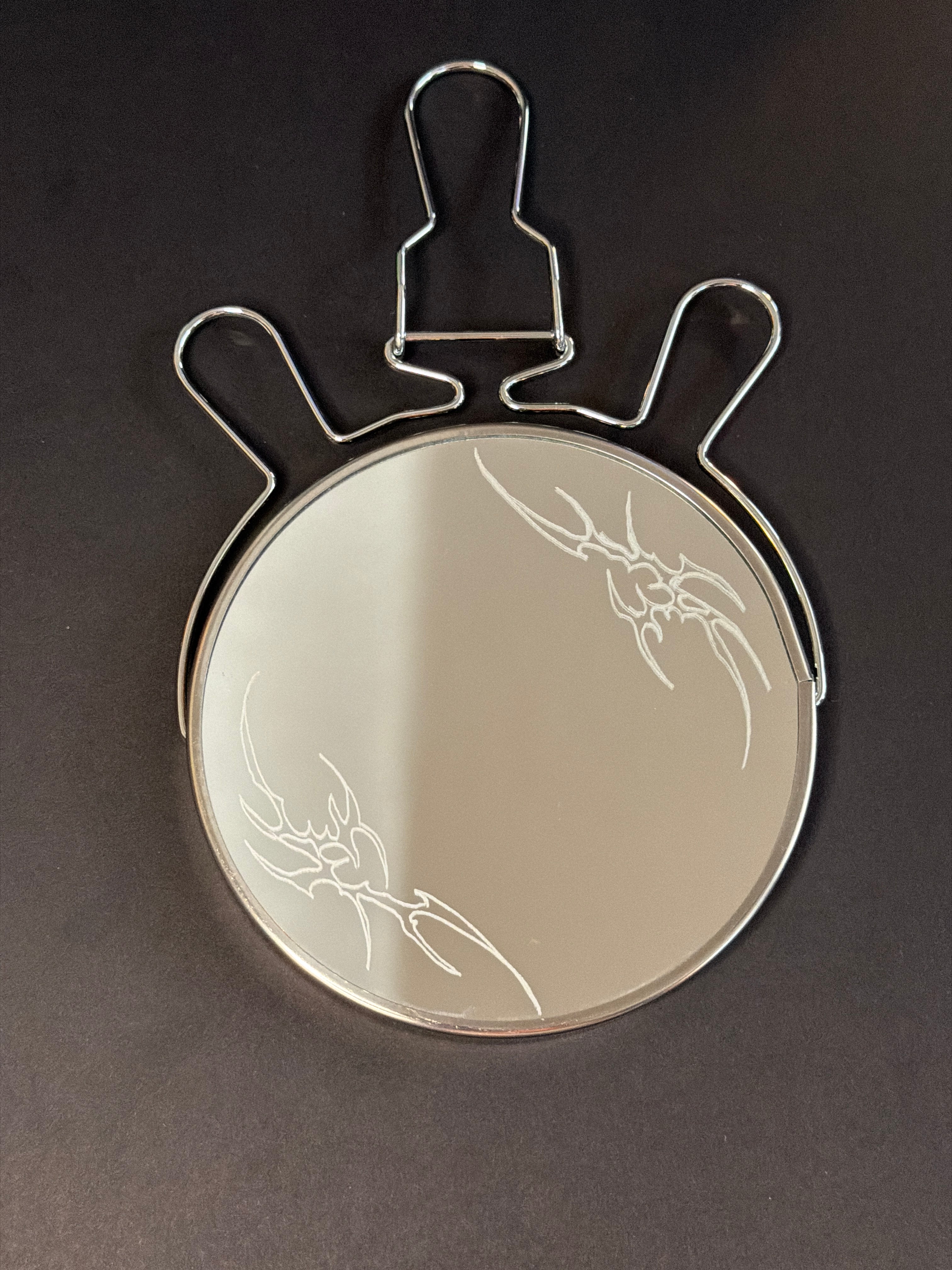 Tribal flame mirror